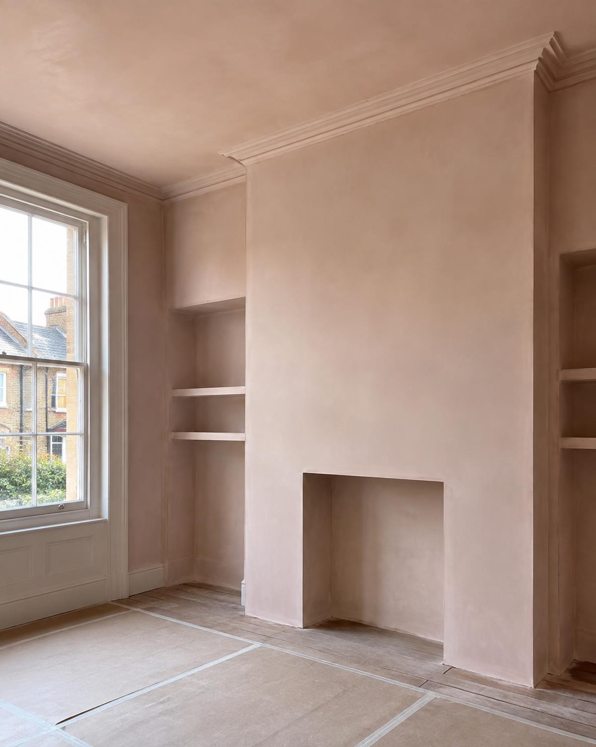 Renovated period room with a smooth plaster finish